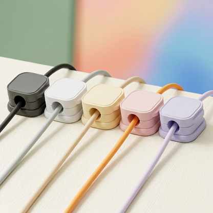Rounded-square cable clip color samples guiding individual cables